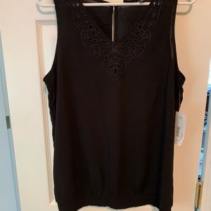 Black sleeveless tops.  V necks.  I am selling both together.